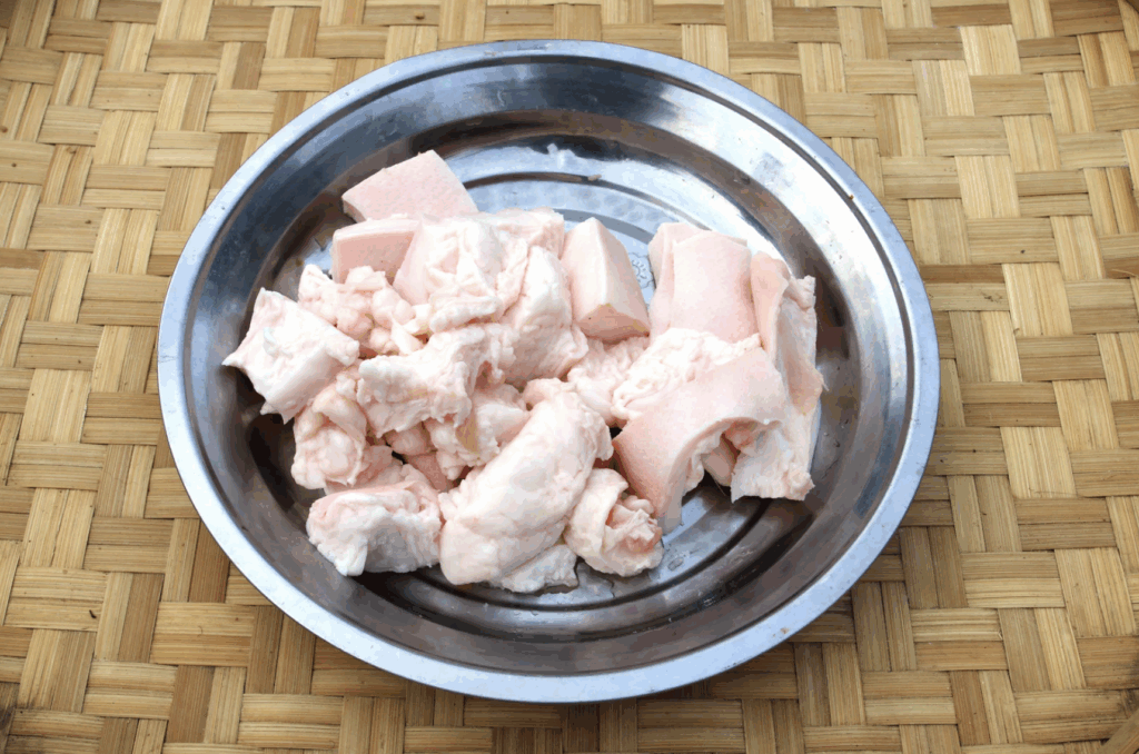 Beef tallow in a metal bowl